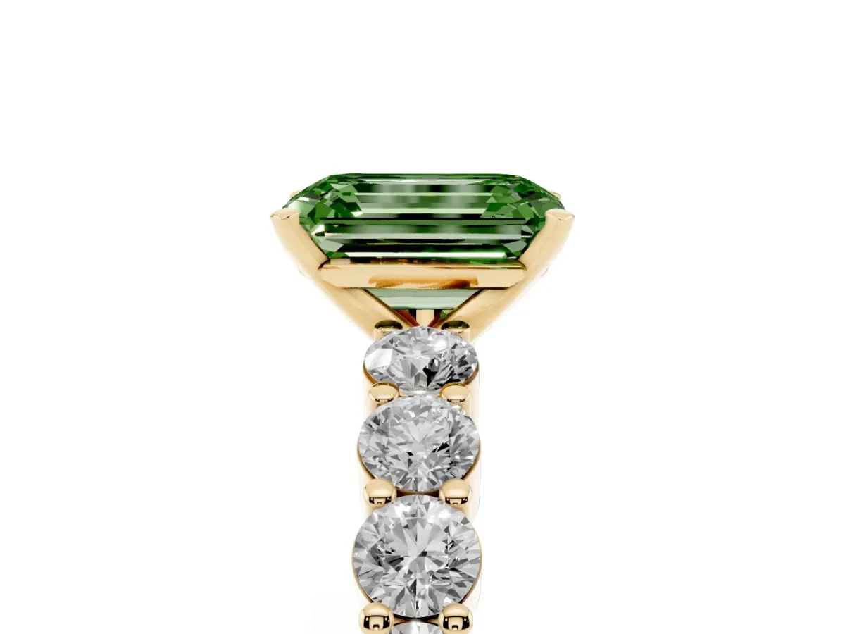 Fancy Green Emerald Cut Diamond Solitaire Ring with Shared Prong Round Side Stones Yellow gold