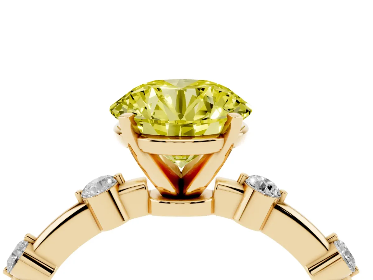 Fancy Yellow Round Cut Solitaire Diamond Ring with Bezel Set Side Stones and Prong Setting Yellow gold