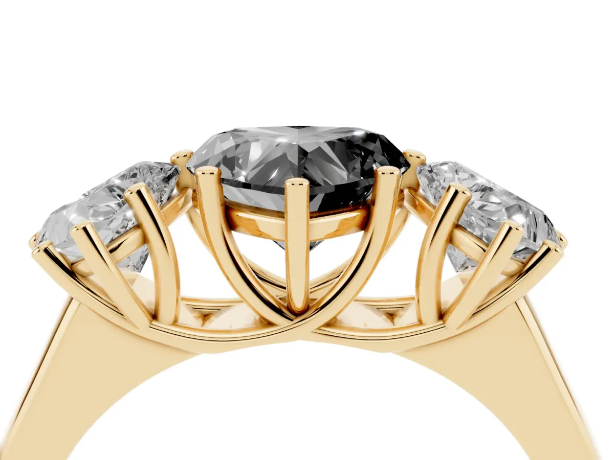 Fancy Black Heart Cut Three-Stone Diamond Ring with Prong Setting on a Classic Band Yellow gold
