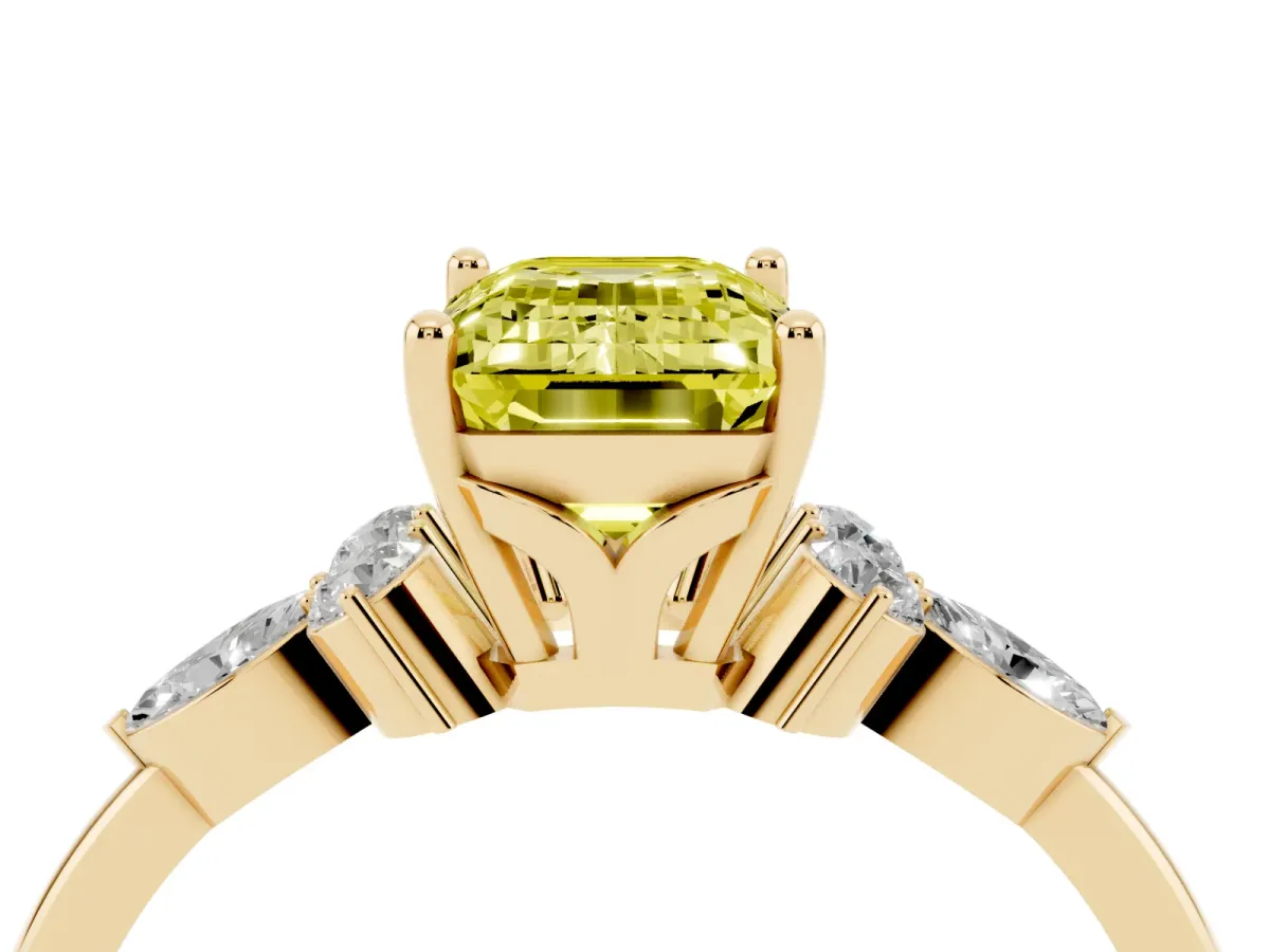 Fancy Yellow Emerald Cut Brilliant Diamond Solitaire Ring with Pear Side Stones and Four-Prong Setting Yellow gold