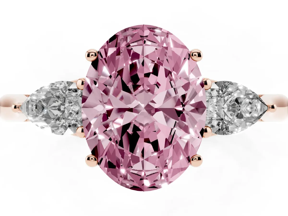 Fancy Pink Three-Stone Oval Cut Diamond Ring with Pear Side Stones in Four-Prong Setting Rose gold