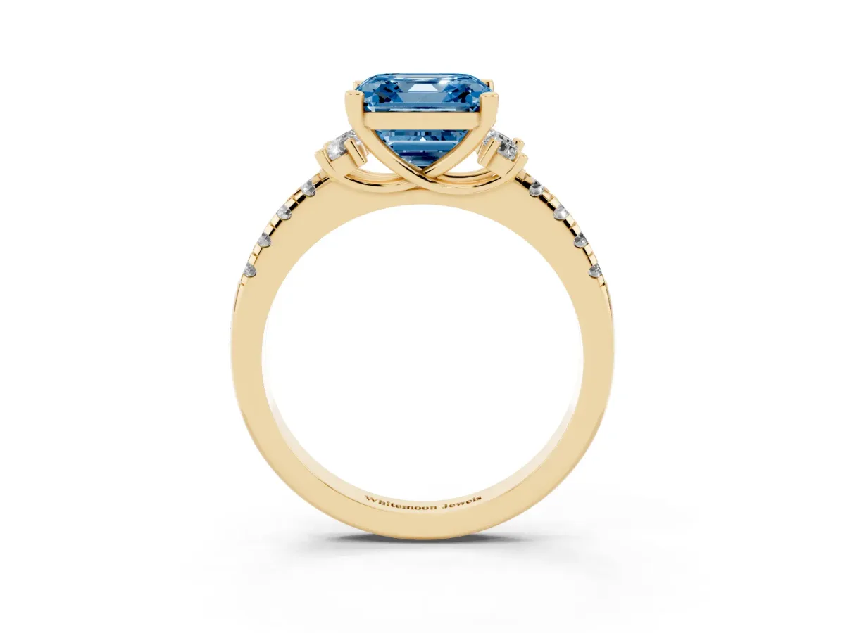 Fancy Blue Asscher Cut Diamond Three-Stone Pave Band with Four-Prong Setting Yellow gold