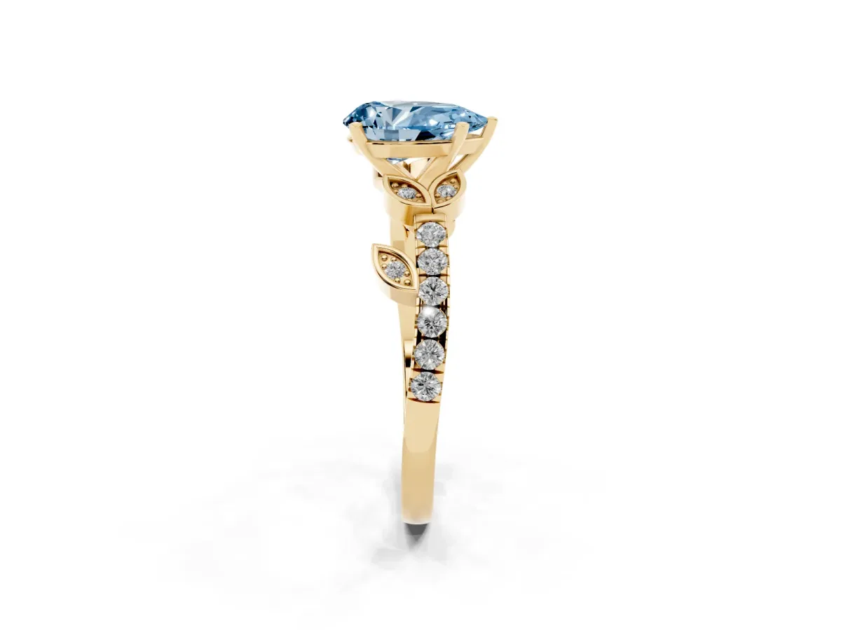 Fancy Blue Pear Cut Solitaire Leaf-Inspired Diamond Ring with Pavé Band and Four-Prong Setting Yellow gold