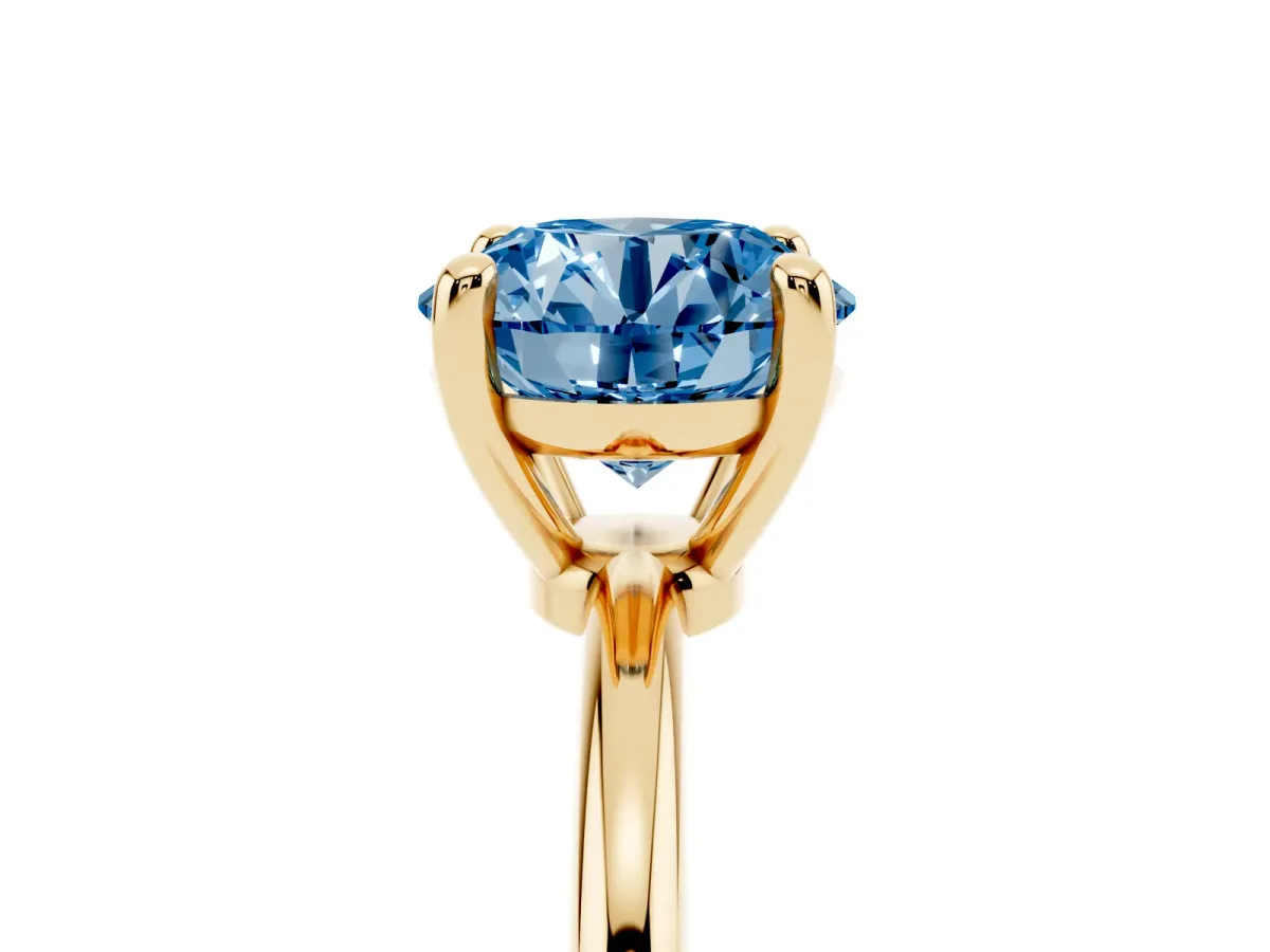 Fancy Blue Round Cut Solitaire Diamond Ring with 4-Prong Setting on a Classic Band Yellow gold