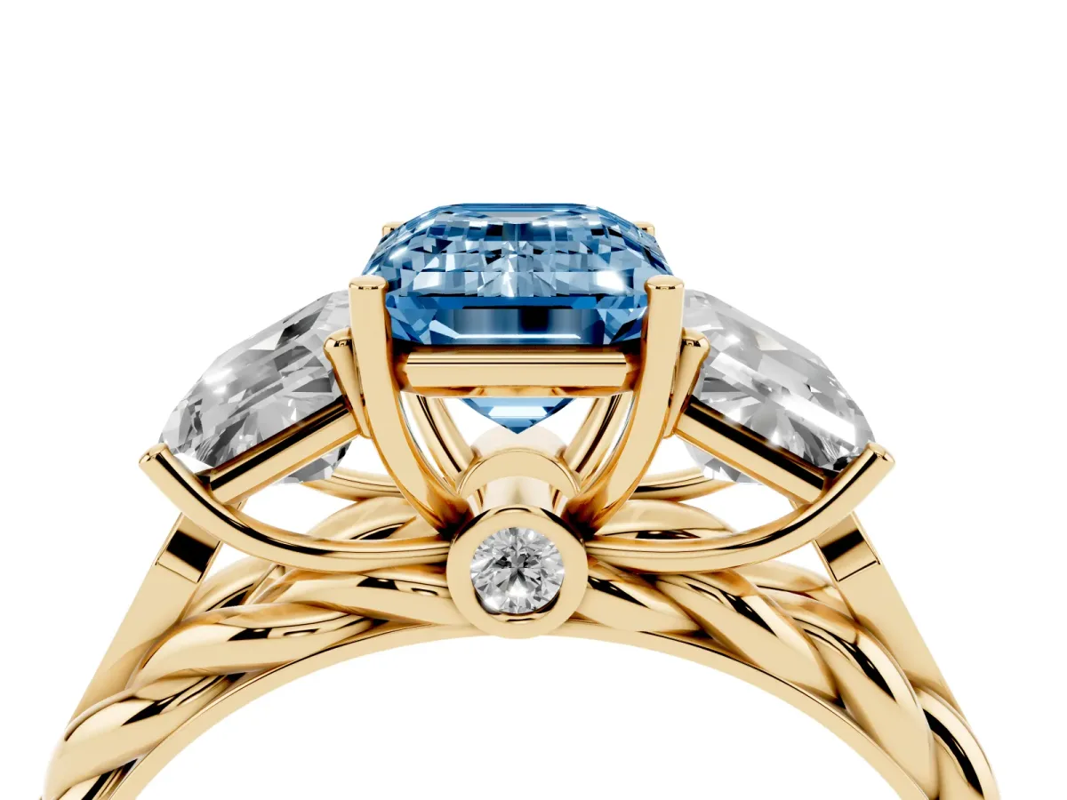 Fancy Blue Three-Stone Radiant Cut Diamond Braided Band Ring with Four-Prong Setting Yellow gold