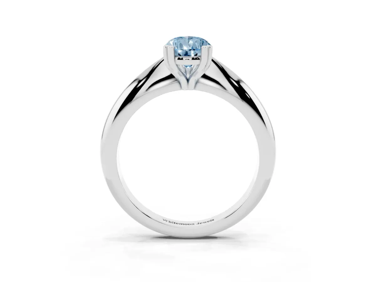 Fancy Blue Pear Cut Cut Solitaire Engagement Ring with Tapered Band and Four-Prong Setting White gold