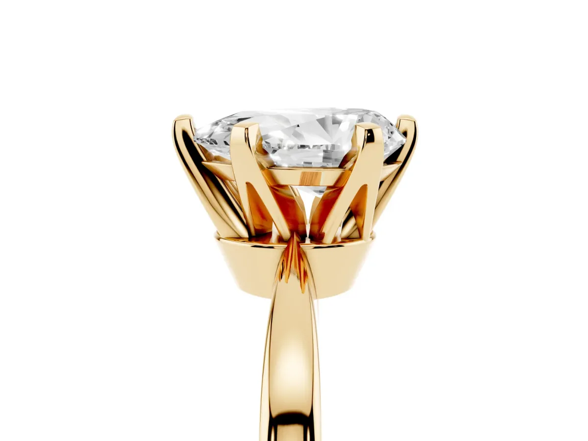 Pear Cut Solitaire Engagement Ring with Six-Prong Setting and Tapered Band Yellow gold