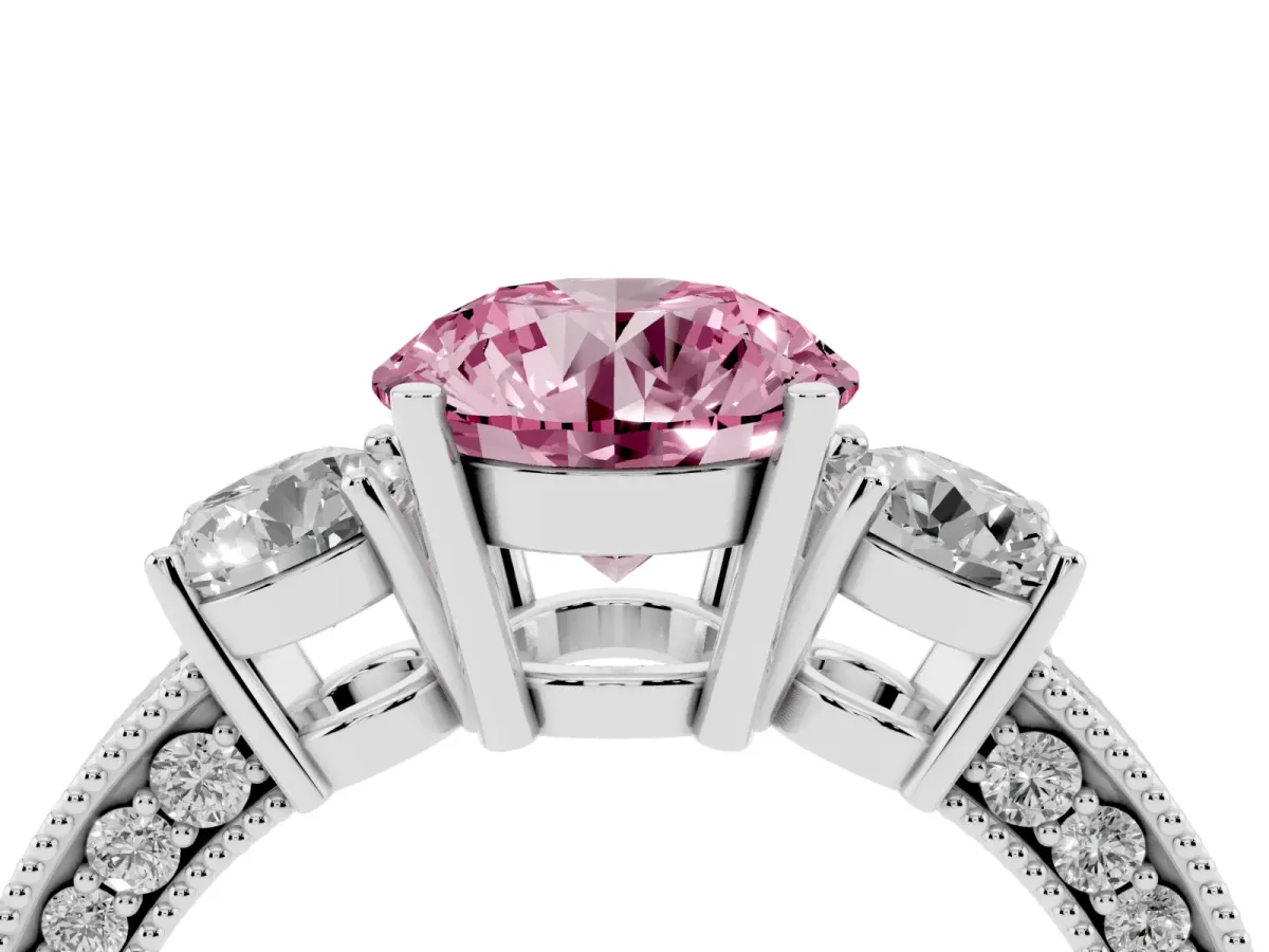 Fancy Pink Round Cut Three-Stone Diamond Ring with Pavé Band and Four-Prong Setting Silver