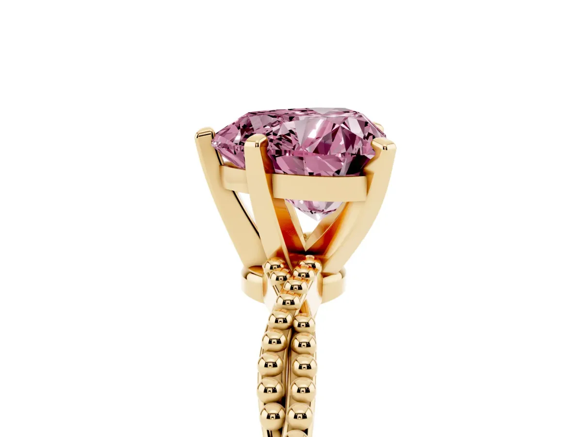 Fancy Pink Heart Cut Solitaire Twisted Band with Bead Prong Setting Yellow gold