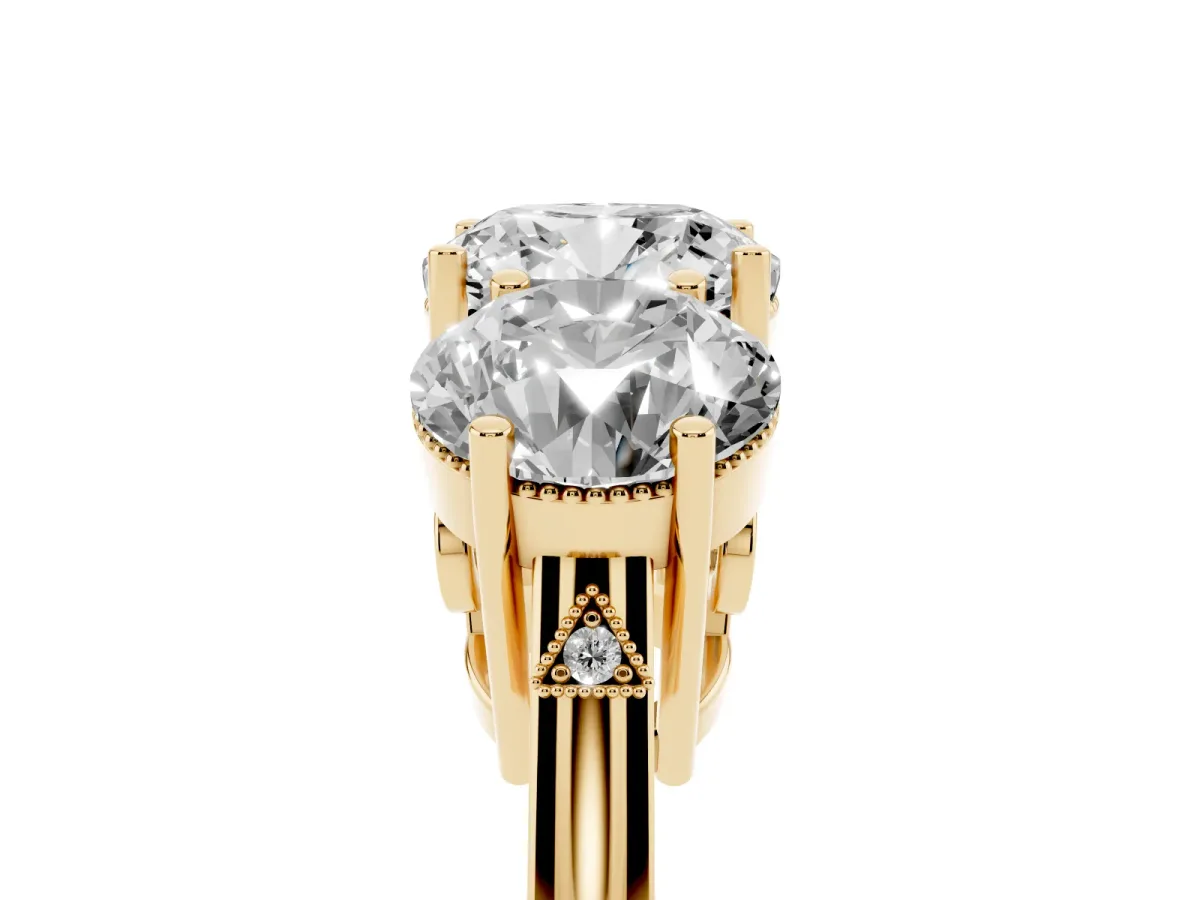 Three-Stone Cushion Cut Diamond Engagement Ring with Prong Setting on a Classic Band Yellow gold