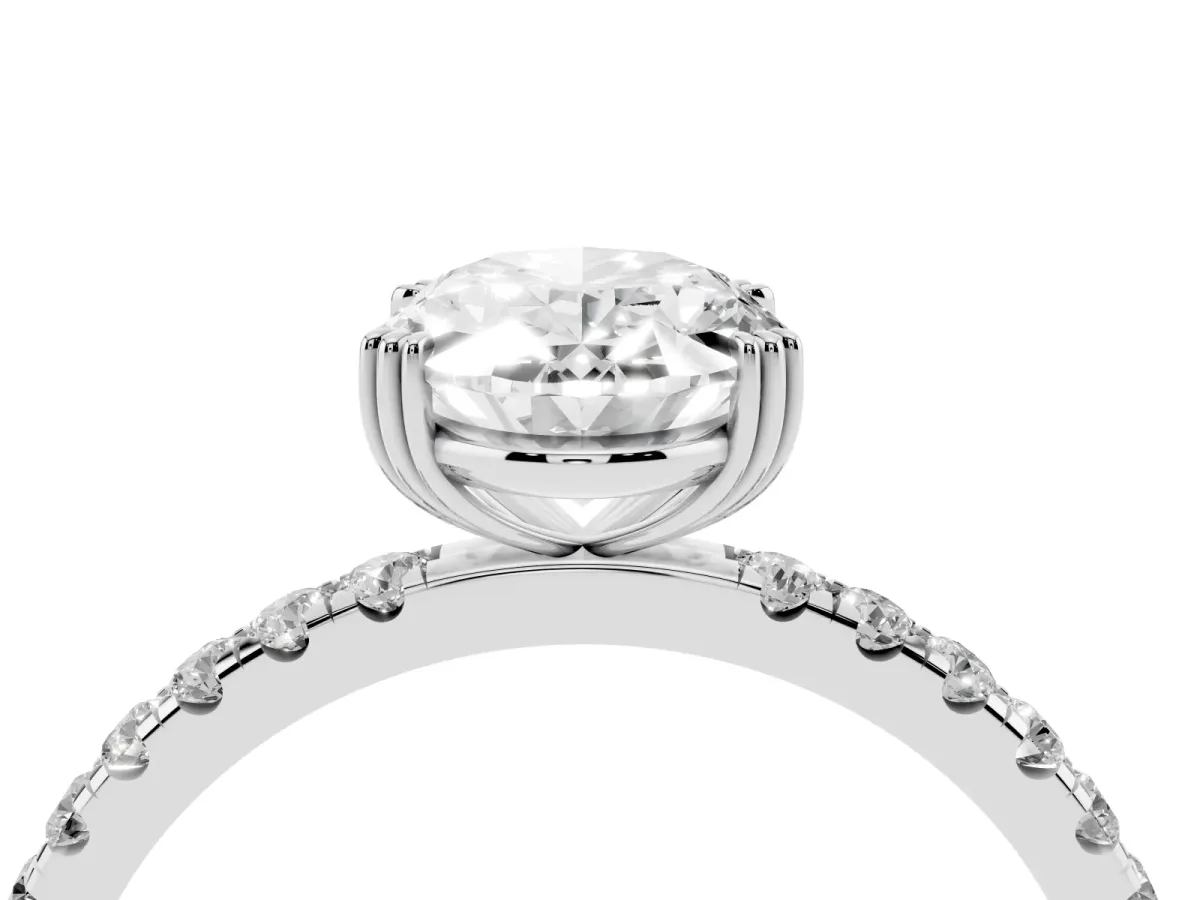 Oval Cut Brilliant Solitaire with Pavé Band and Claw Prong Setting Silver