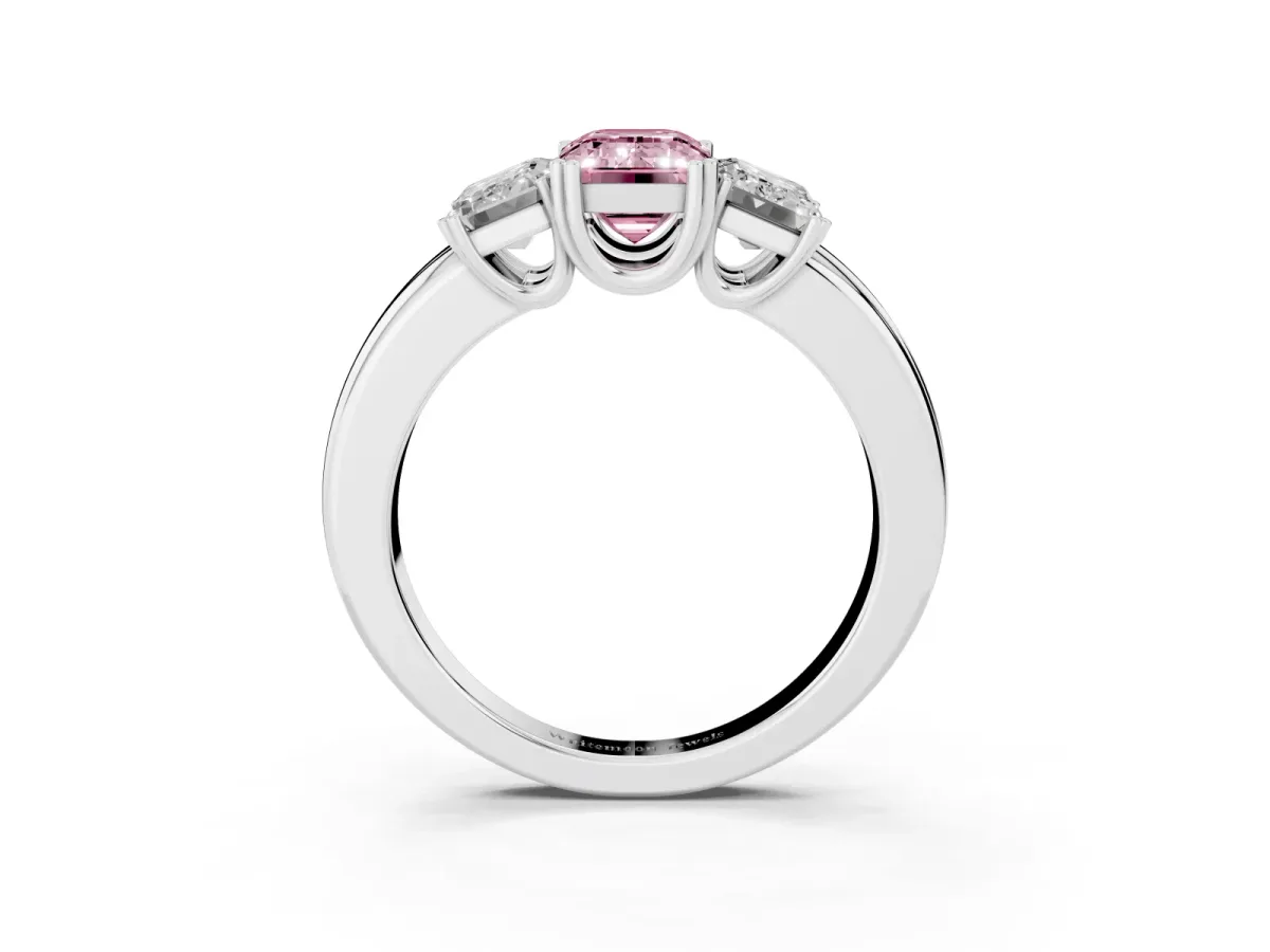 Fancy Pink Three-Stone Emerald Cut Cut Diamond Ring with Channel Set Band and Four-Prong Setting Silver