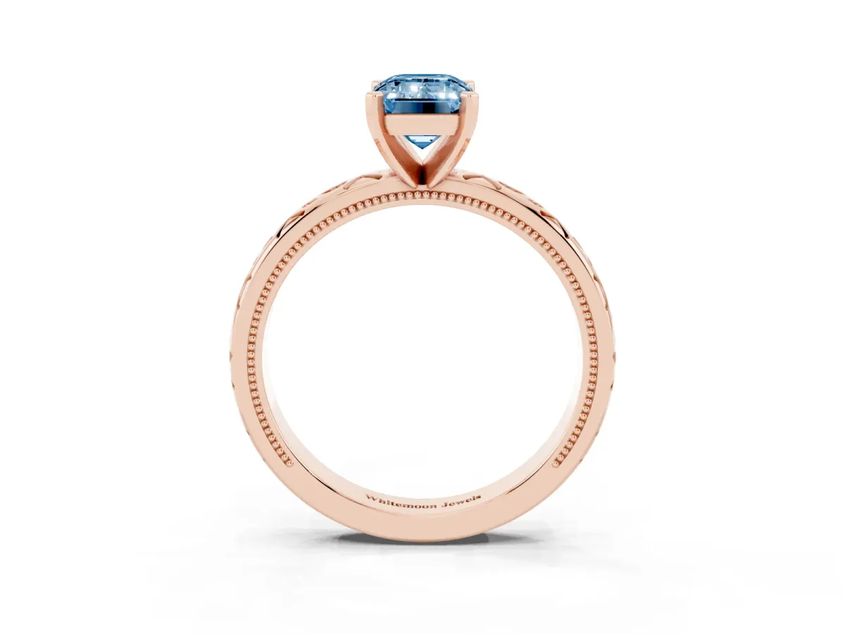 Fancy Blue Emerald Cut Solitaire Engagement Ring with Scrollwork Band and Four-Prong Setting Rose gold