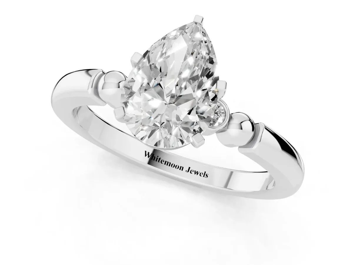 Pear Cut Solitaire Beaded Band with Four-Prong Setting White gold