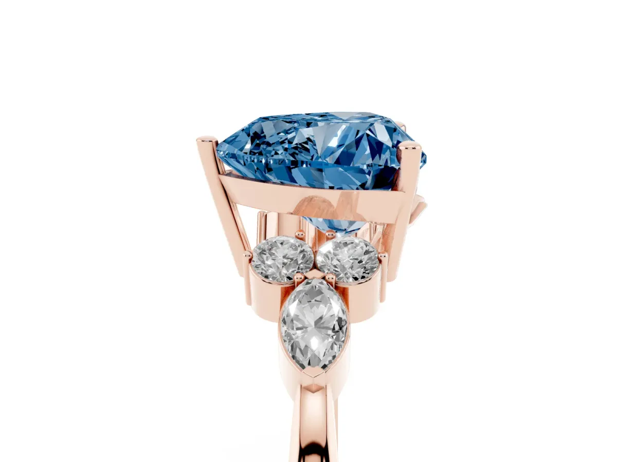 Fancy Blue Heart Cut Brilliant Diamond Solitaire Ring with Pear Side Stones and Four-Prong Setting Rose gold