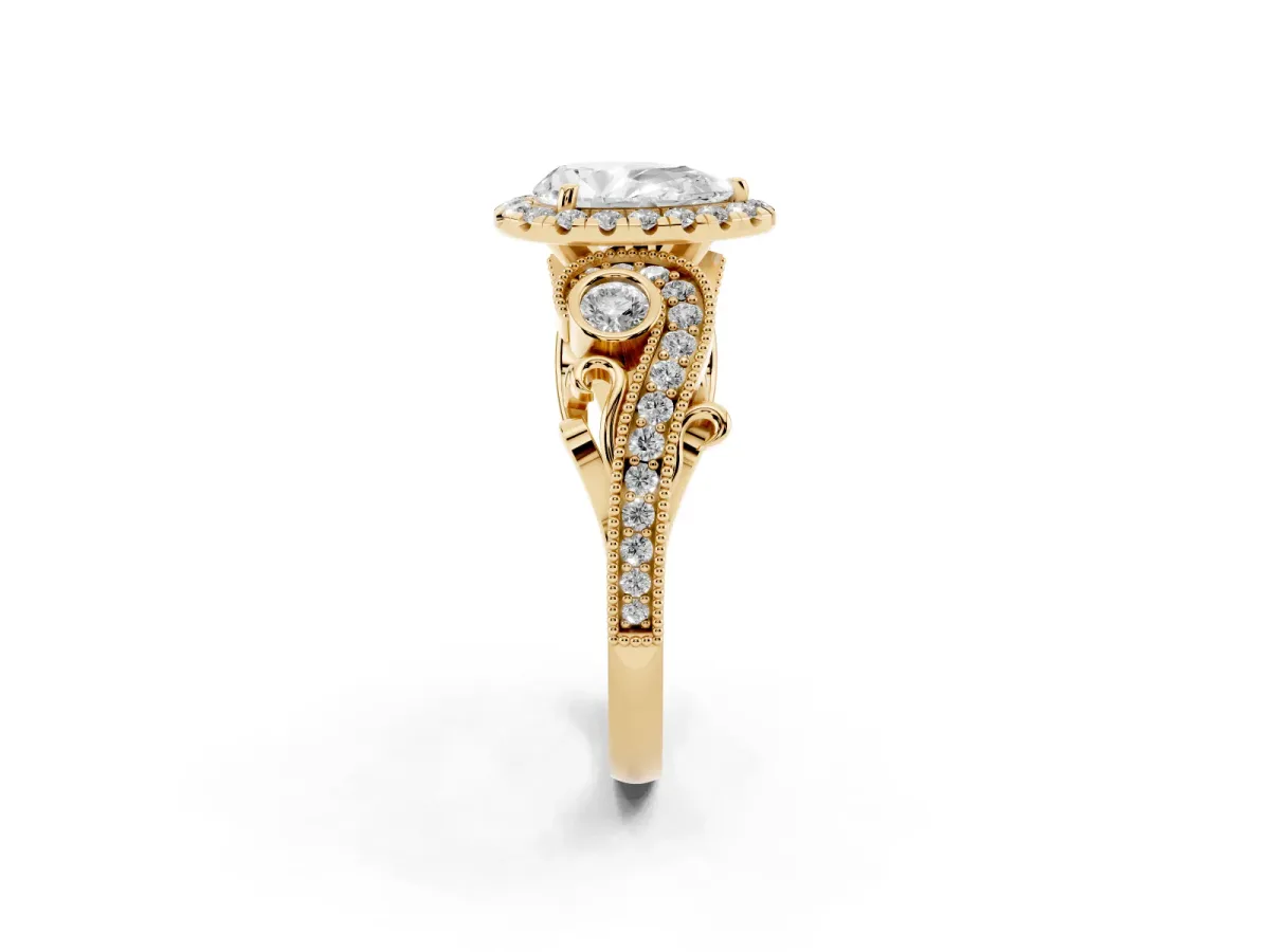 Pear Cut Diamond Halo Ring with Milgrain Pavé Band and Four-Prong Setting Yellow gold