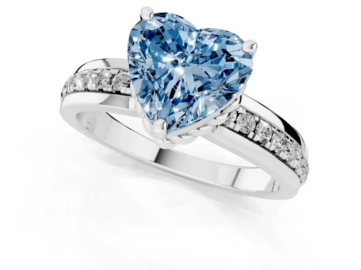 Fancy Blue Heart Cut Solitaire Diamond Ring with Channel Set Band and Six-Prong Setting Platinum