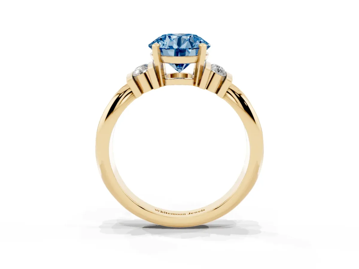 Fancy Blue Round Cut Cut Three-Stone Channel Set Ring with Bar Prongs Yellow gold