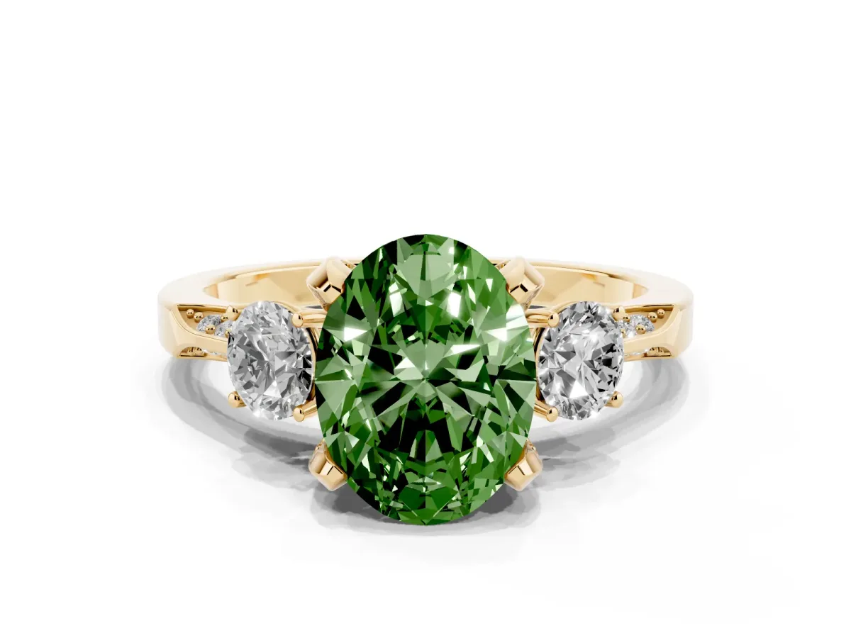 Fancy Green Oval Cut Brilliant Three-Stone Diamond Ring with Pavé Band and Four-Prong Setting Yellow gold