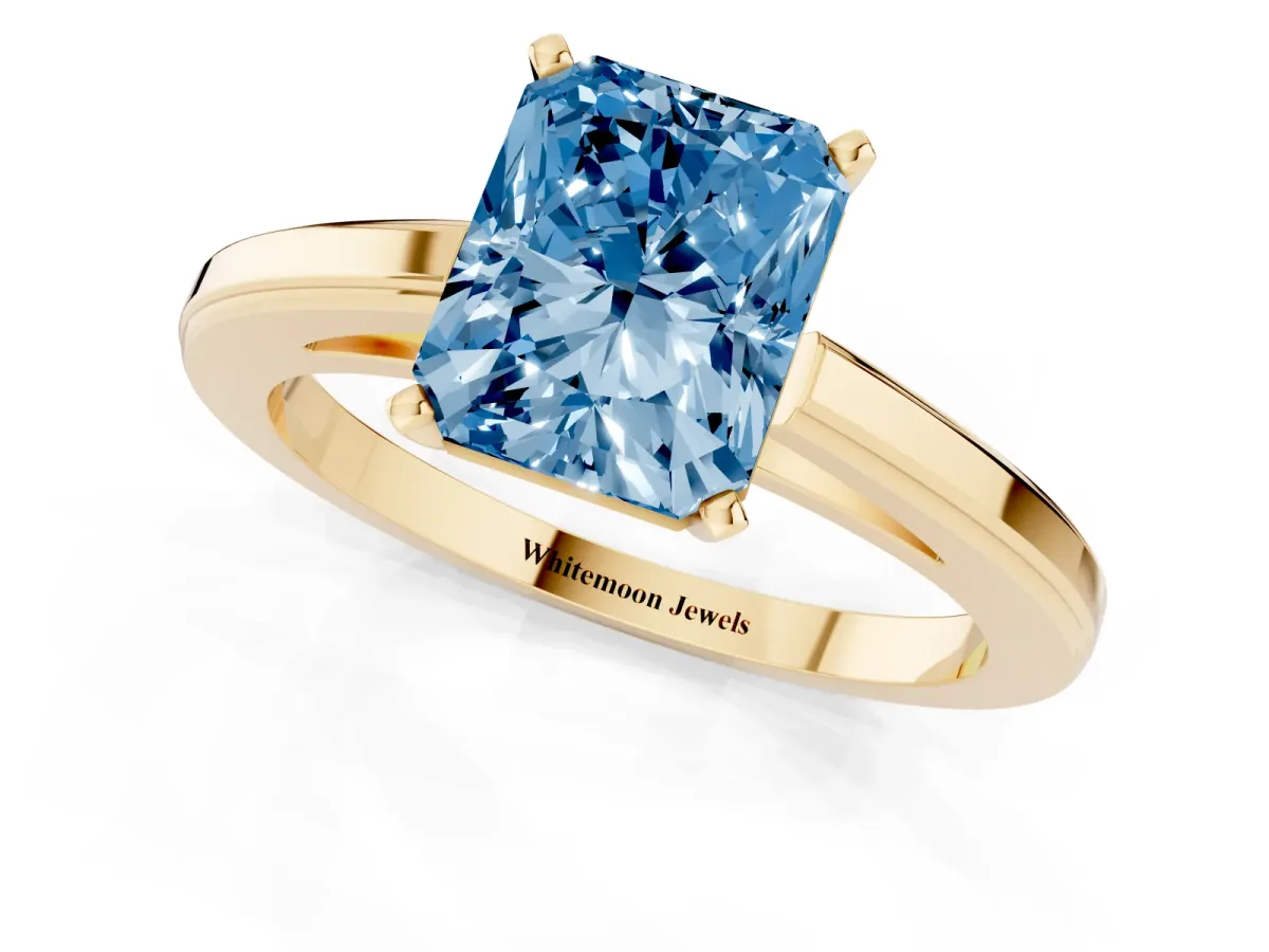 Fancy Blue Radiant Cut Solitaire Diamond Ring with Four-Prong Setting and Classic Band Yellow gold