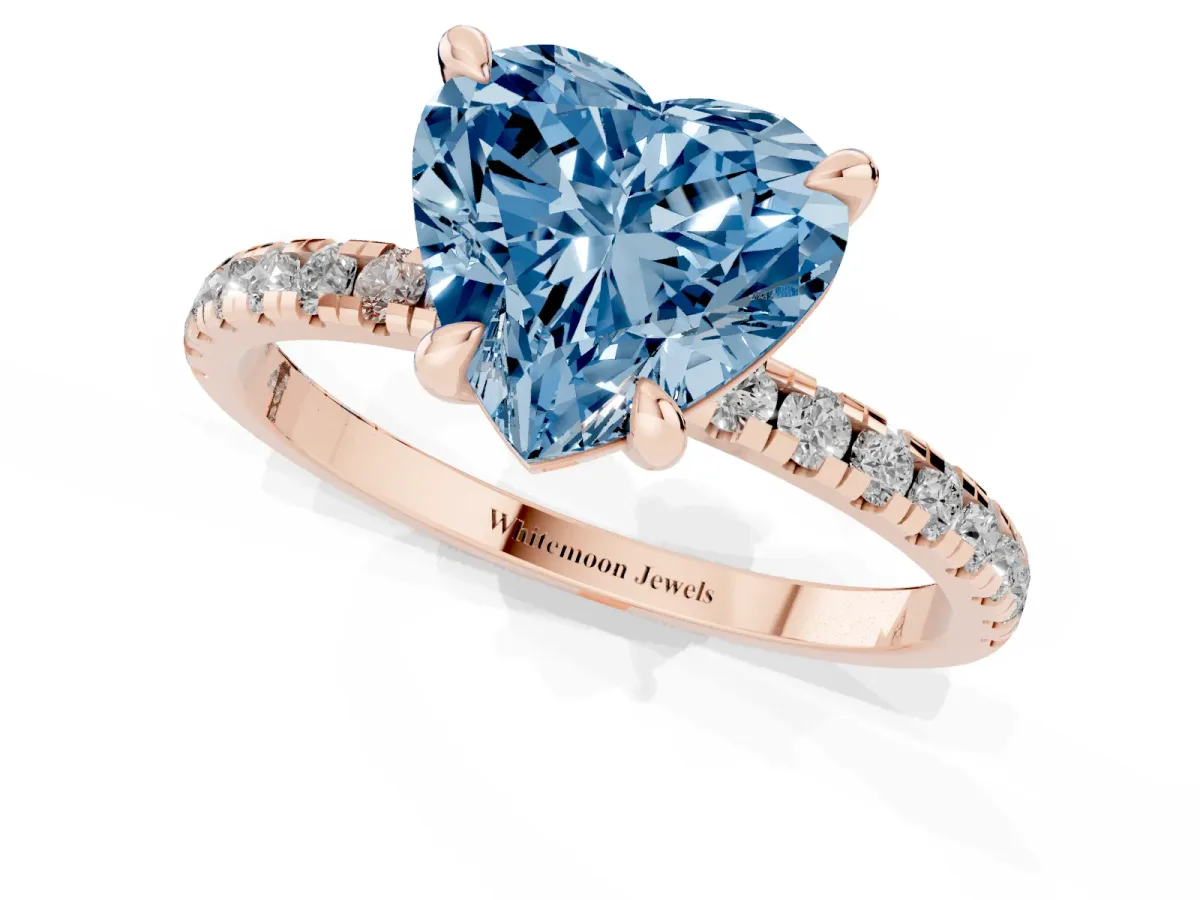 Fancy Blue Heart Cut Diamond Brilliant Solitaire Ring with Pavé Band and Four-Prong Setting Rose gold
