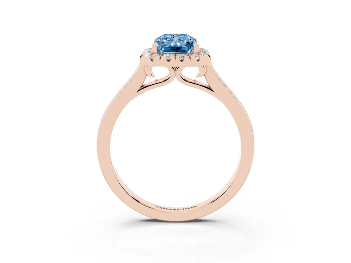 Fancy Blue Radiant Cut Halo Round Diamond Solitaire Ring with Pavé Band and Four-Prong Setting Rose gold