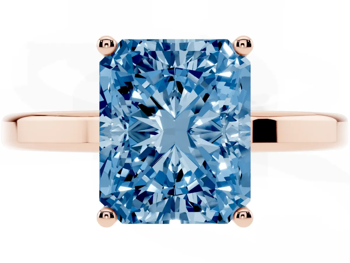 Fancy Blue Radiant Cut Cut Solitaire Engagement Ring with Four-Prong Setting on a Classic Band Rose gold