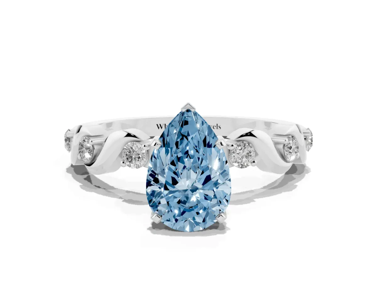 Fancy Blue Pear Cut Diamond Solitaire Twisted Band with Round Accents and Prong Setting Platinum