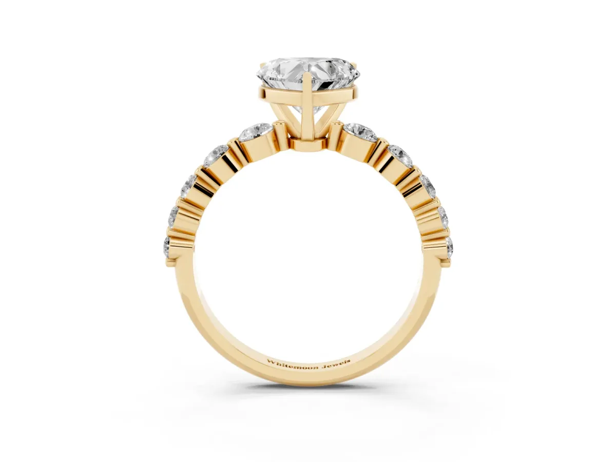 Heart Cut Solitaire Diamond Ring with Pave Band and Four-Prong Setting Yellow gold