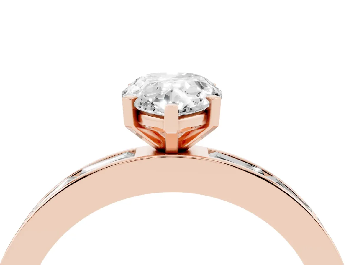 Pear Cut Solitaire Diamond Ring with Channel-Set Baguette Band and Four-Prong Setting Rose gold