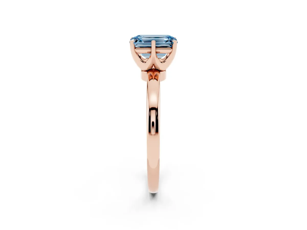 Fancy Blue Emerald Cut Solitaire Diamond Ring with Six-Prong Setting on a Classic Band Rose gold