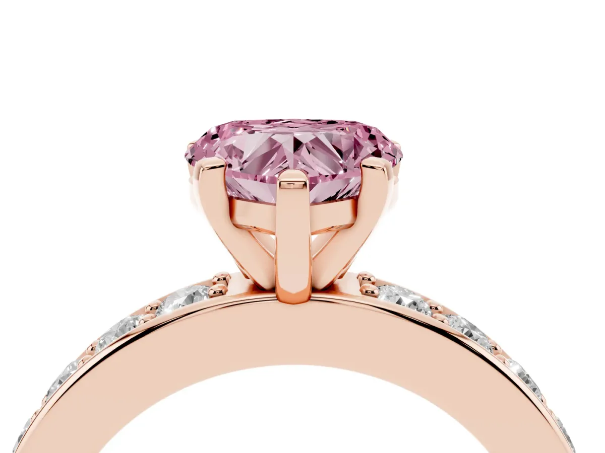 Fancy Pink Heart Cut Diamond Engagement Ring with Channel Set Round Band and Prong Setting Rose gold