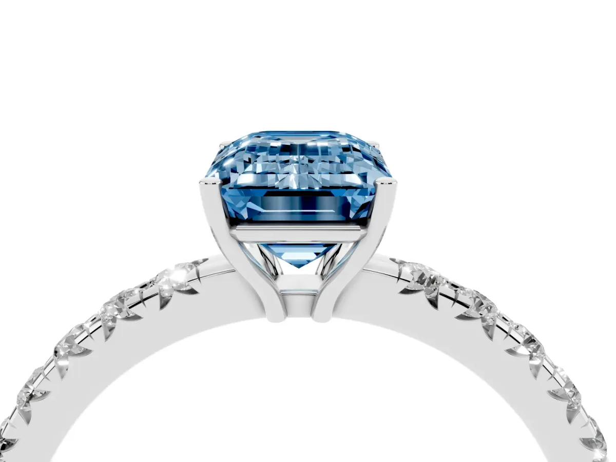 Fancy Blue Emerald Cut Diamond Pavé Solitaire Engagement Ring with Four-Prong Setting Platinum