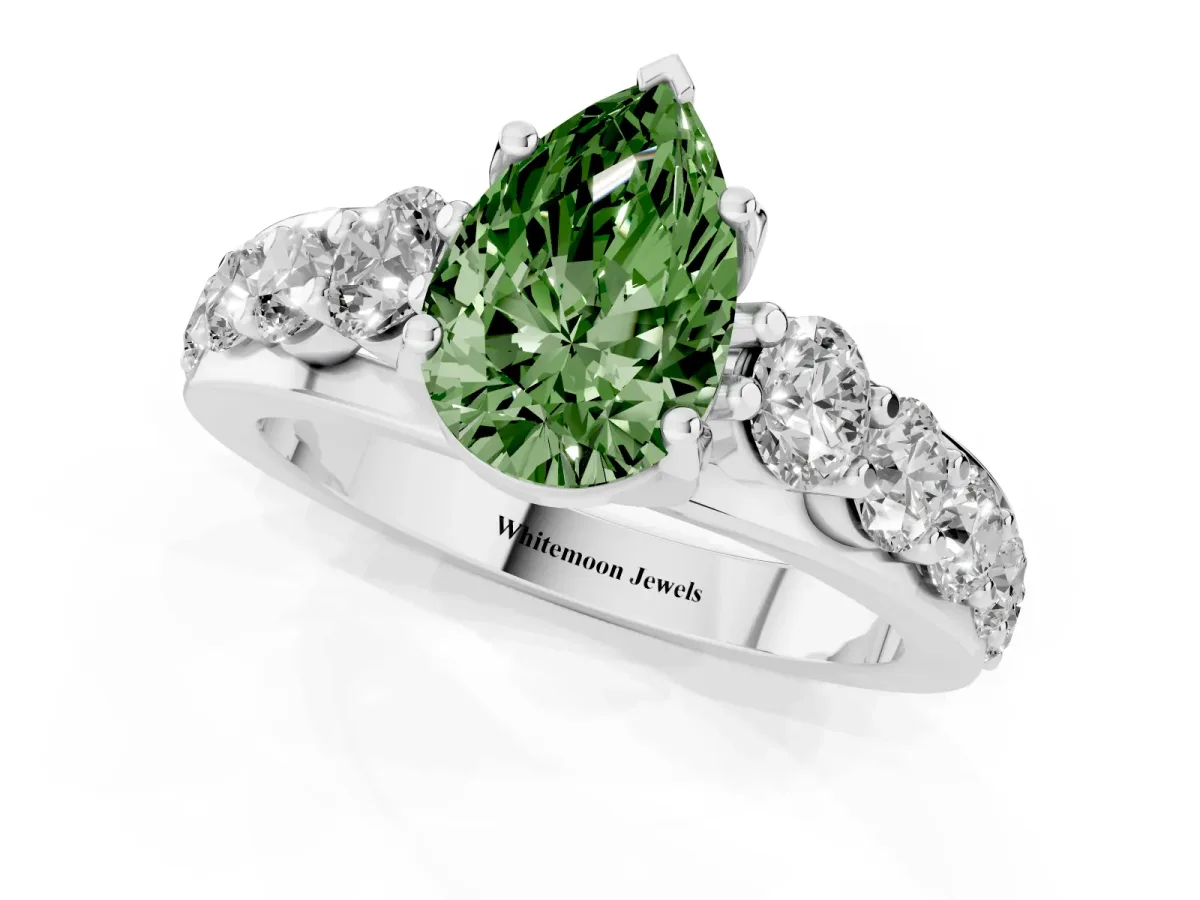 Fancy Green Pear Cut Diamond Engagement Ring with Pavé Band and Four-Prong Setting White gold