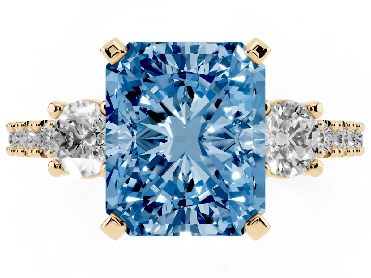 Fancy Blue Radiant Cut Three-Stone Diamond Pavé Band with Prong Setting Yellow gold