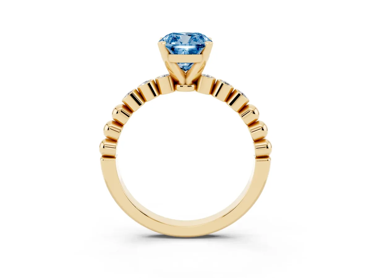Fancy Blue Cushion Cut Solitaire Bezel Accent Diamond Engagement Ring with Beaded Band and Four-Prong Setting Yellow gold