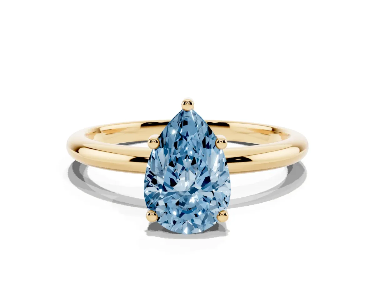 Fancy Blue Pear Cut Cut Solitaire Engagement Ring with Four-Prong Setting and Classic Band Yellow gold