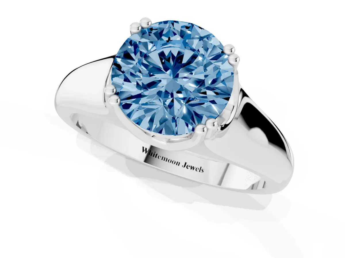 Fancy Blue Round Cut Diamond Solitaire Ring with Wide Band and Prong Setting Silver