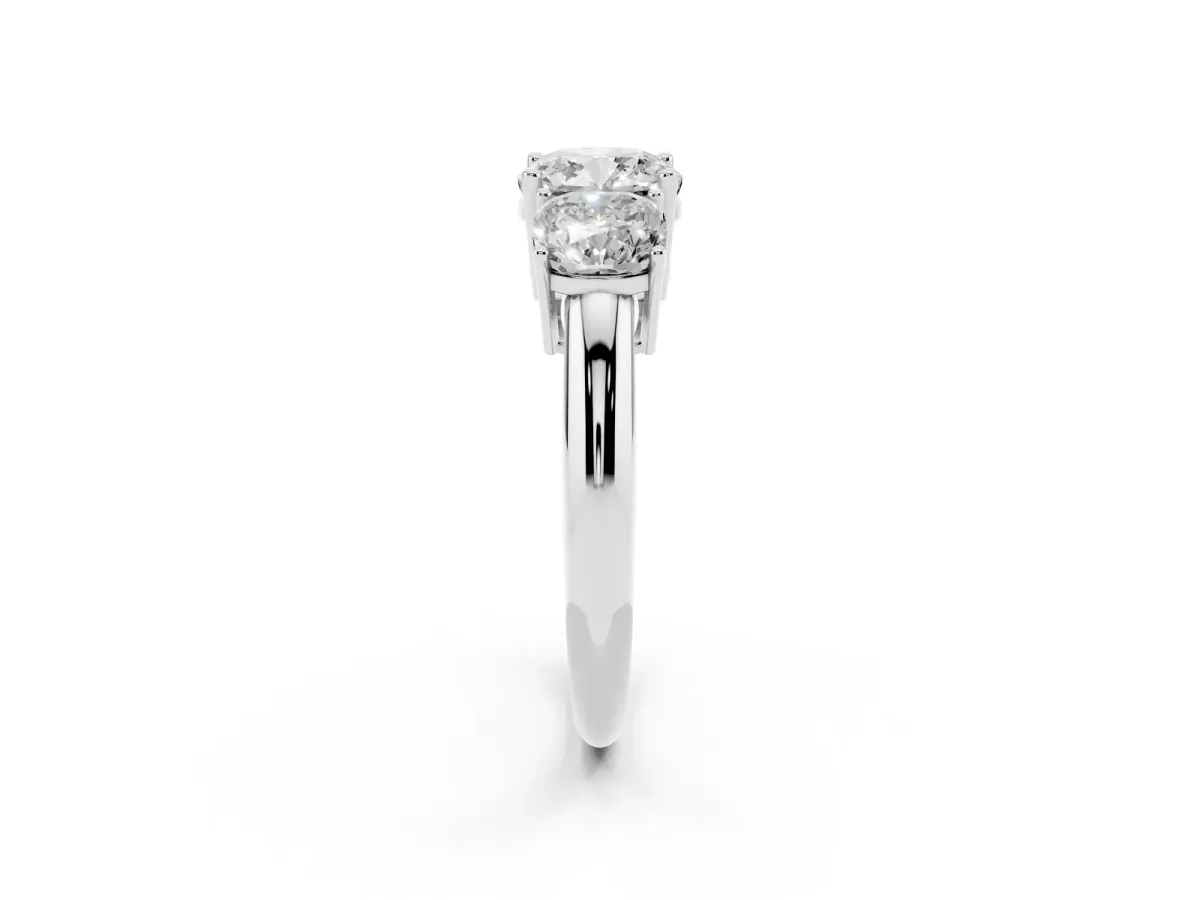 Three-Stone Cushion Cut Cut Diamond Engagement Ring with Prong Setting on a White Gold Band White gold