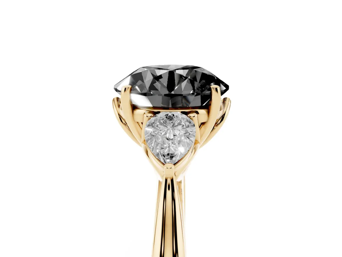 Fancy Black Three-Stone Round Cut Brilliant Diamond Solitaire Ring with Tapered Band and Four-Prong Setting Yellow gold