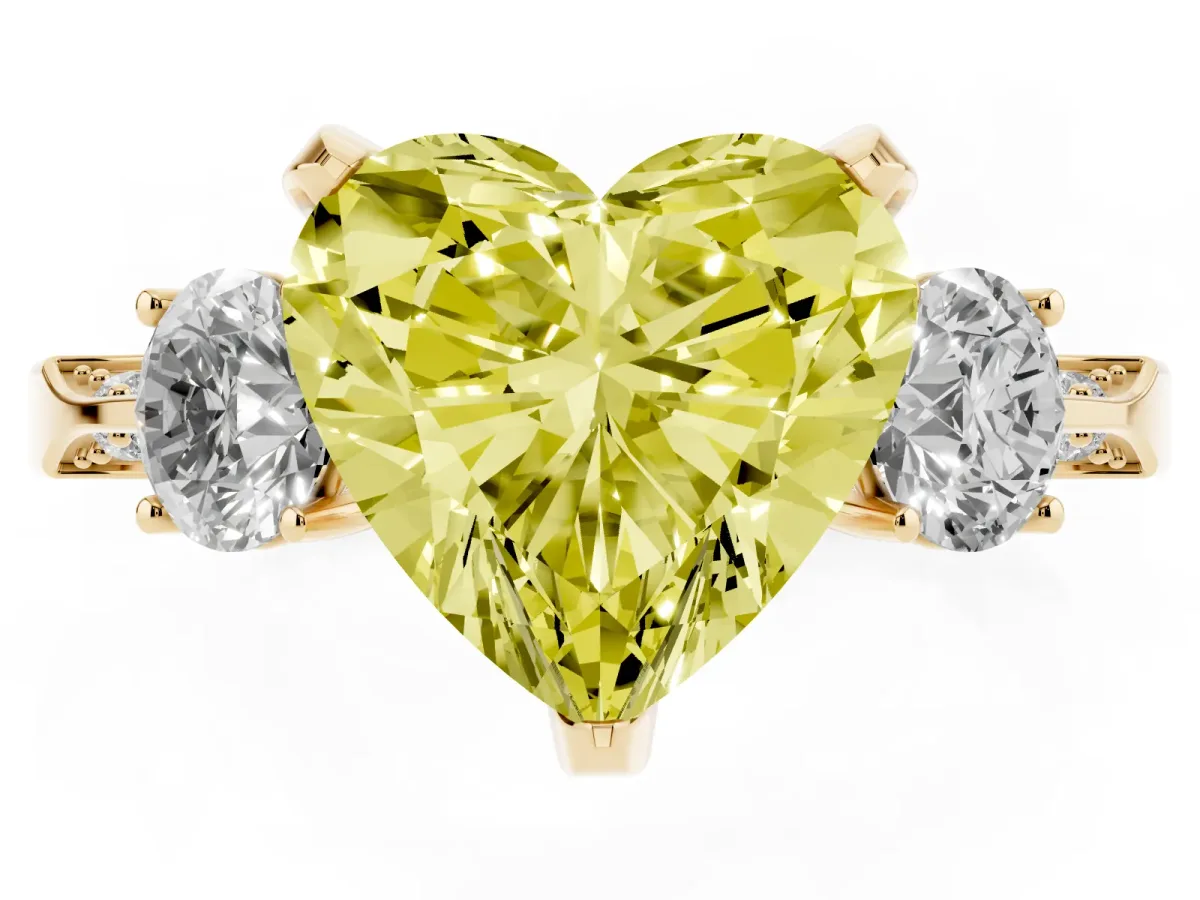 Fancy Yellow Heart Cut Brilliant Three-Stone Diamond Ring with Pavé Band and Four-Prong Setting Yellow gold