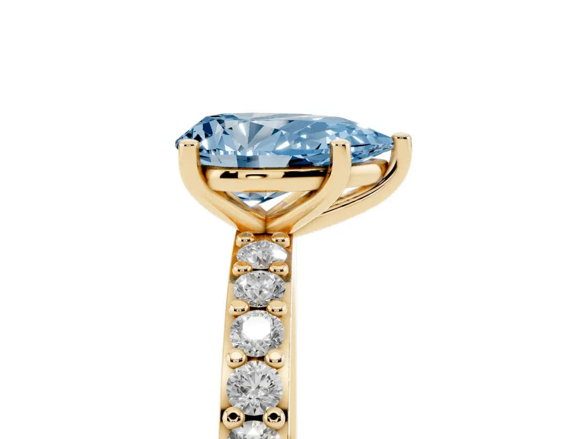 Fancy Blue Pear Cut Cut Diamond Solitaire with Pave Band and Four-Prong Setting Yellow gold