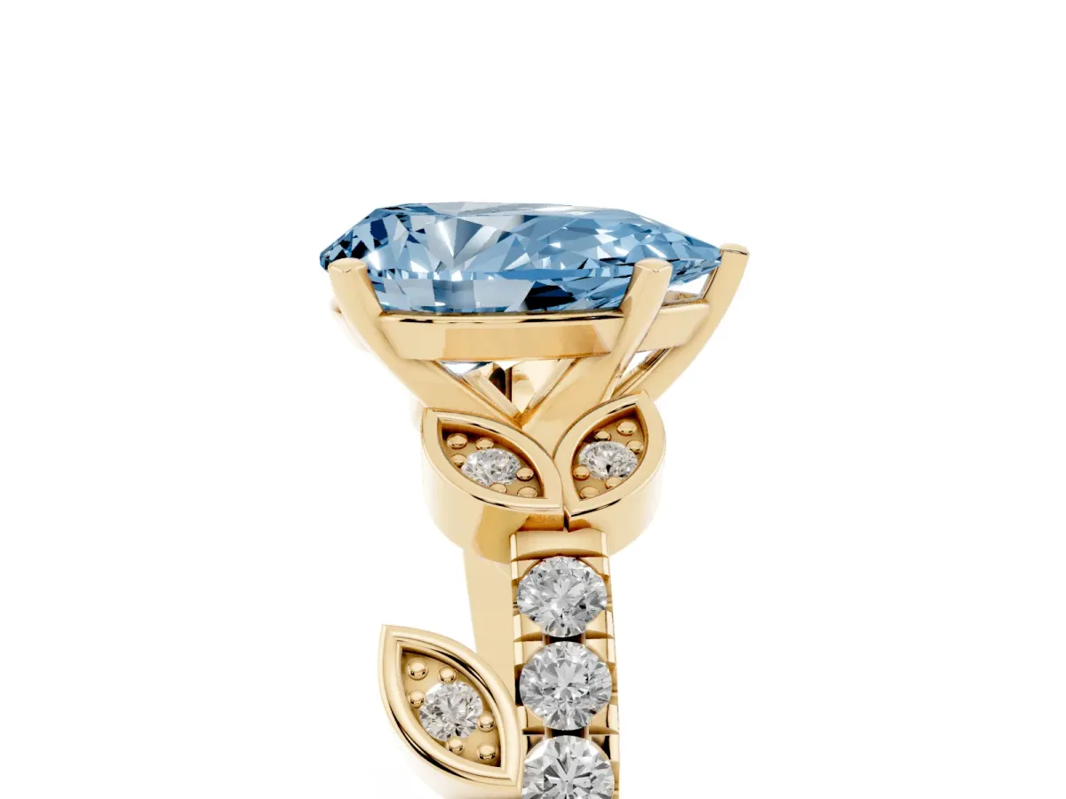 Fancy Blue Pear Cut Solitaire Leaf-Inspired Diamond Ring with Pavé Band and Four-Prong Setting Yellow gold