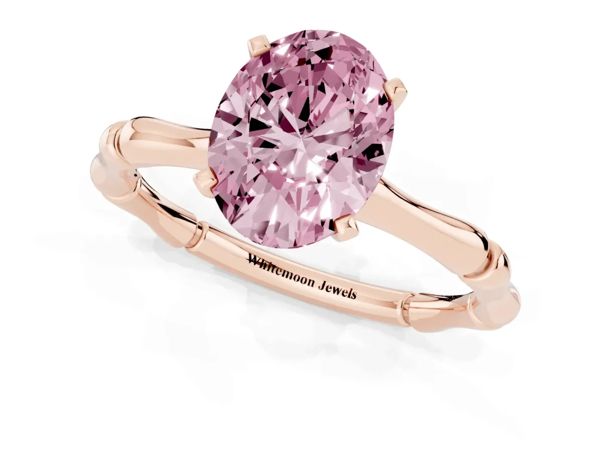 Fancy Pink Oval Cut Solitaire Diamond Ring with Bamboo Band and Four-Prong Setting Rose gold