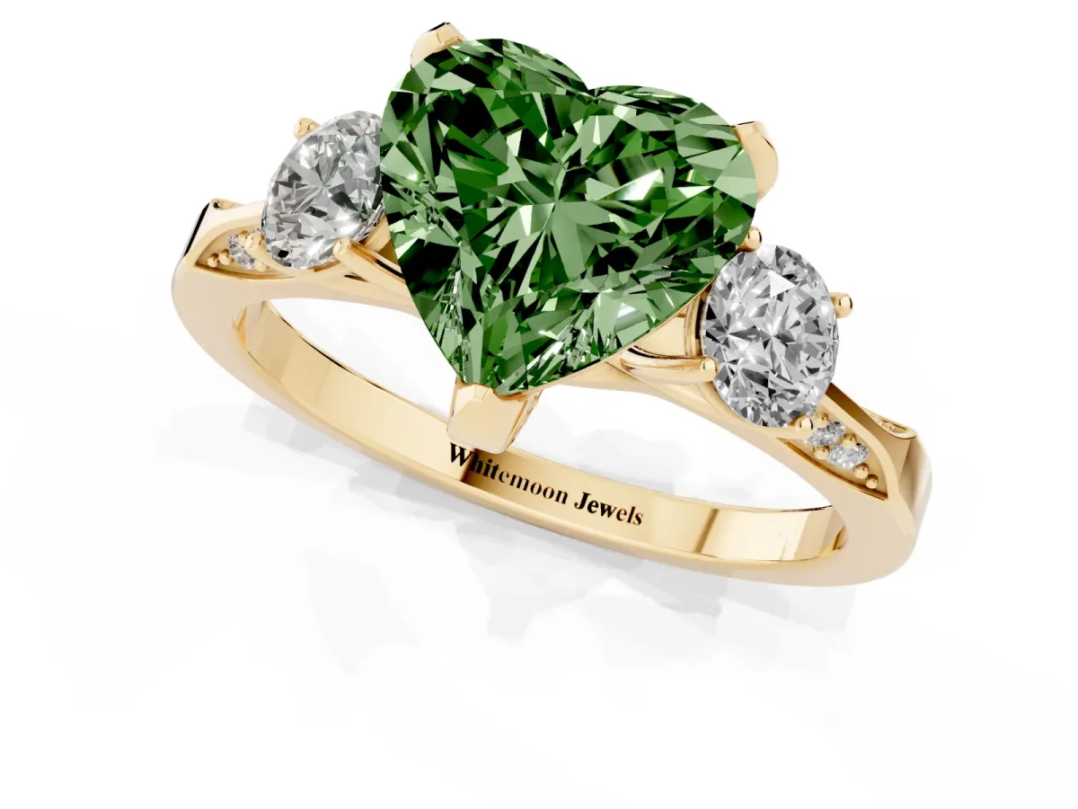 Fancy Green Heart Cut Brilliant Three-Stone Diamond Ring with Pavé Band and Four-Prong Setting Yellow gold