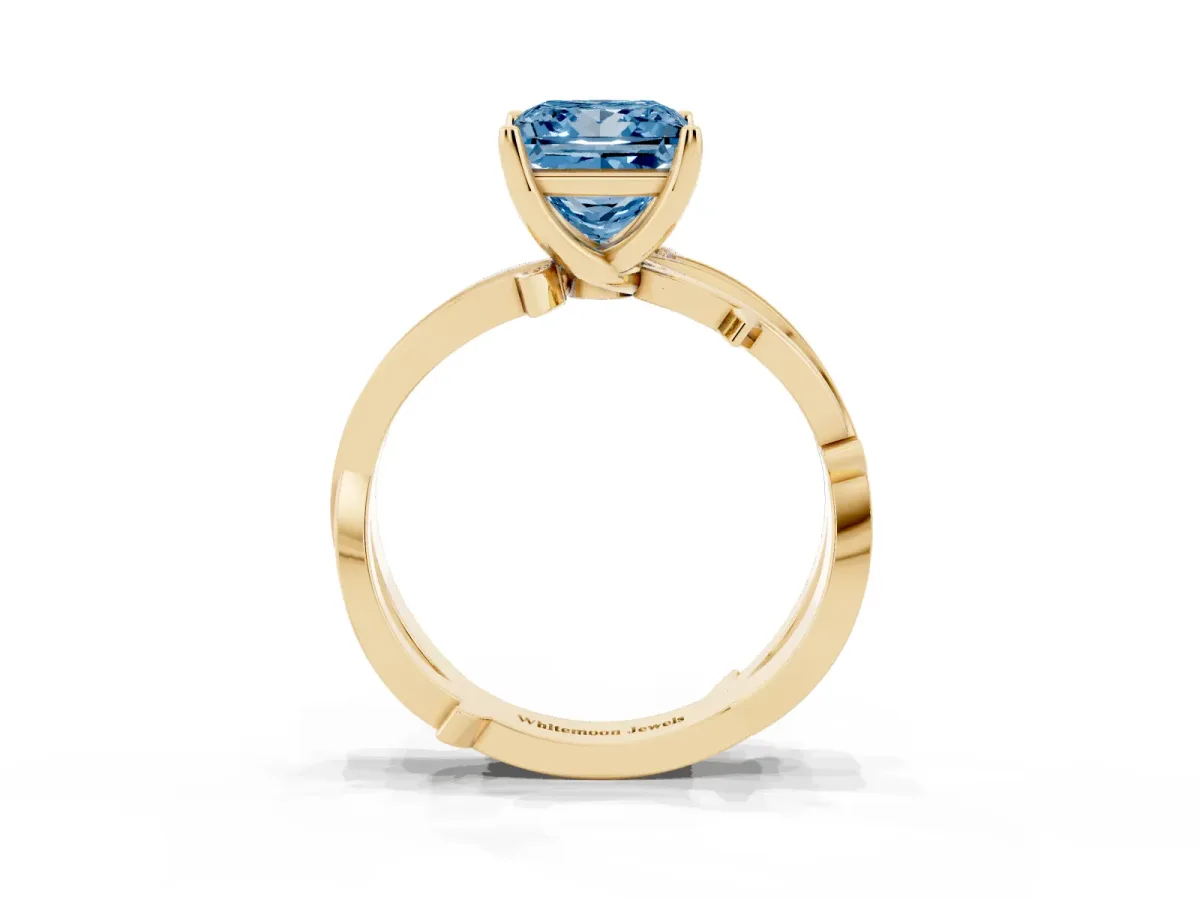 Fancy Blue Princess Cut Solitaire Twist Band with Pavé Accents and Four-Prong Setting Yellow gold