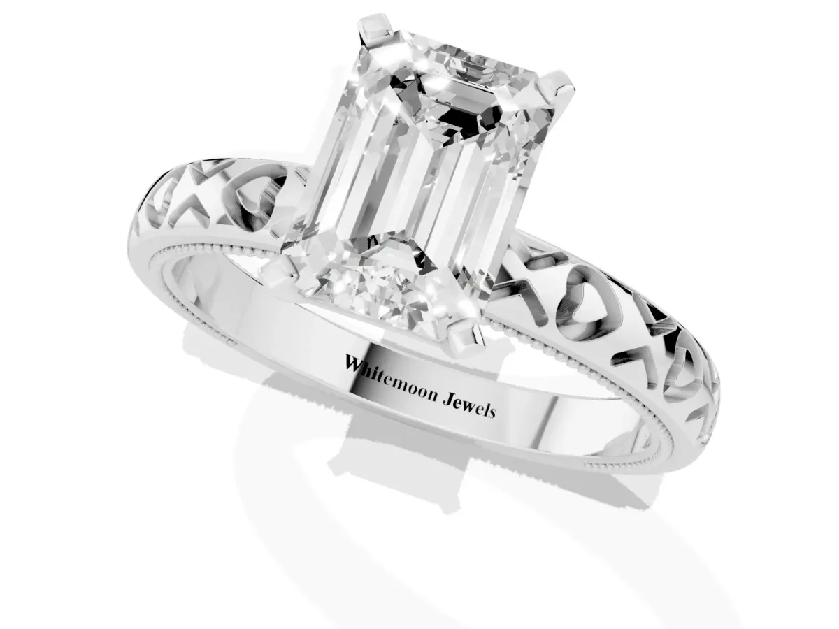 Emerald Cut Solitaire Diamond Engagement Ring with XO Engraved Band and Four-Prong Setting White gold