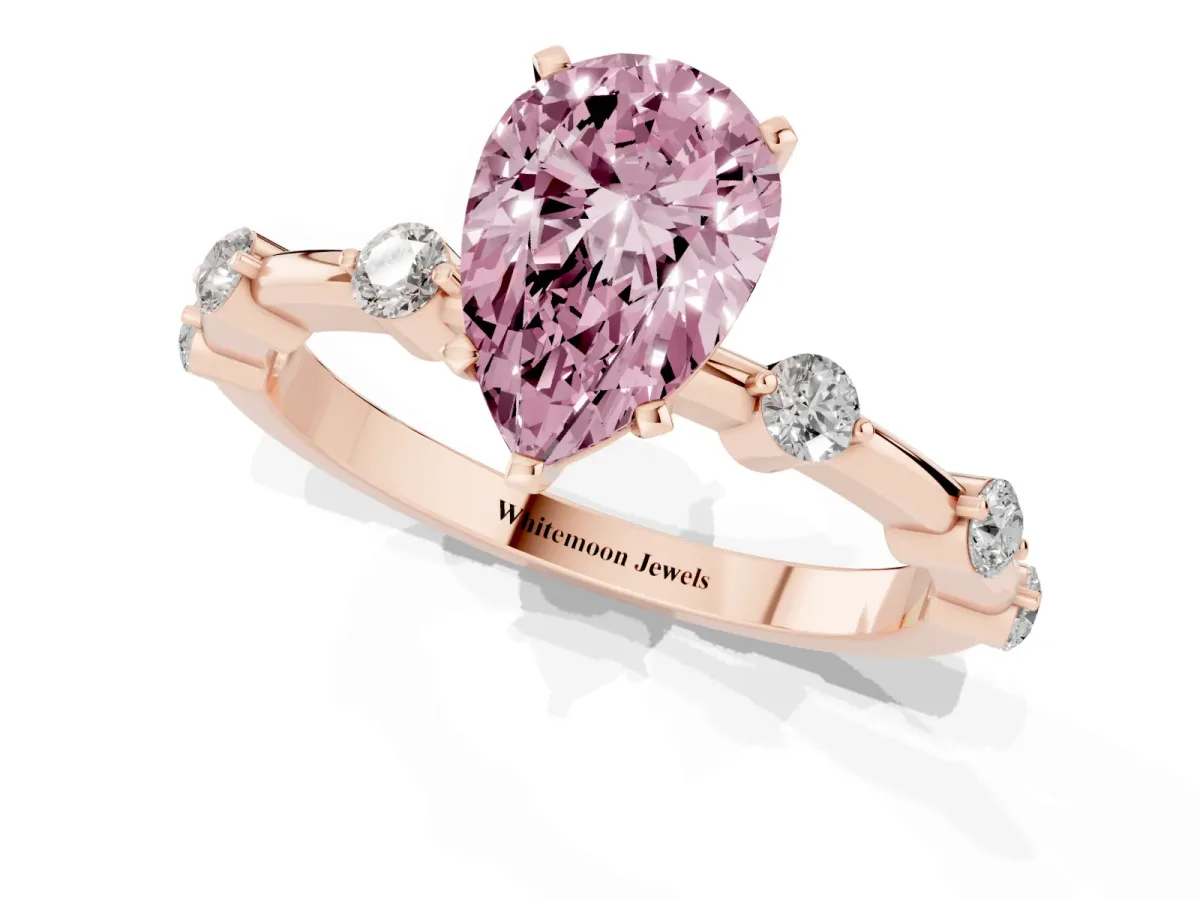 Fancy Pink Pear Cut Solitaire Diamond Ring with Bezel Set Side Stones and Prong Setting Rose gold