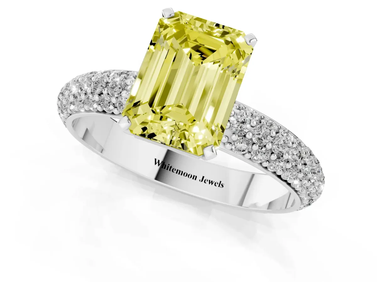 Fancy Yellow Emerald Cut Diamond Solitaire Ring with Prong Setting and Pavé Band Silver