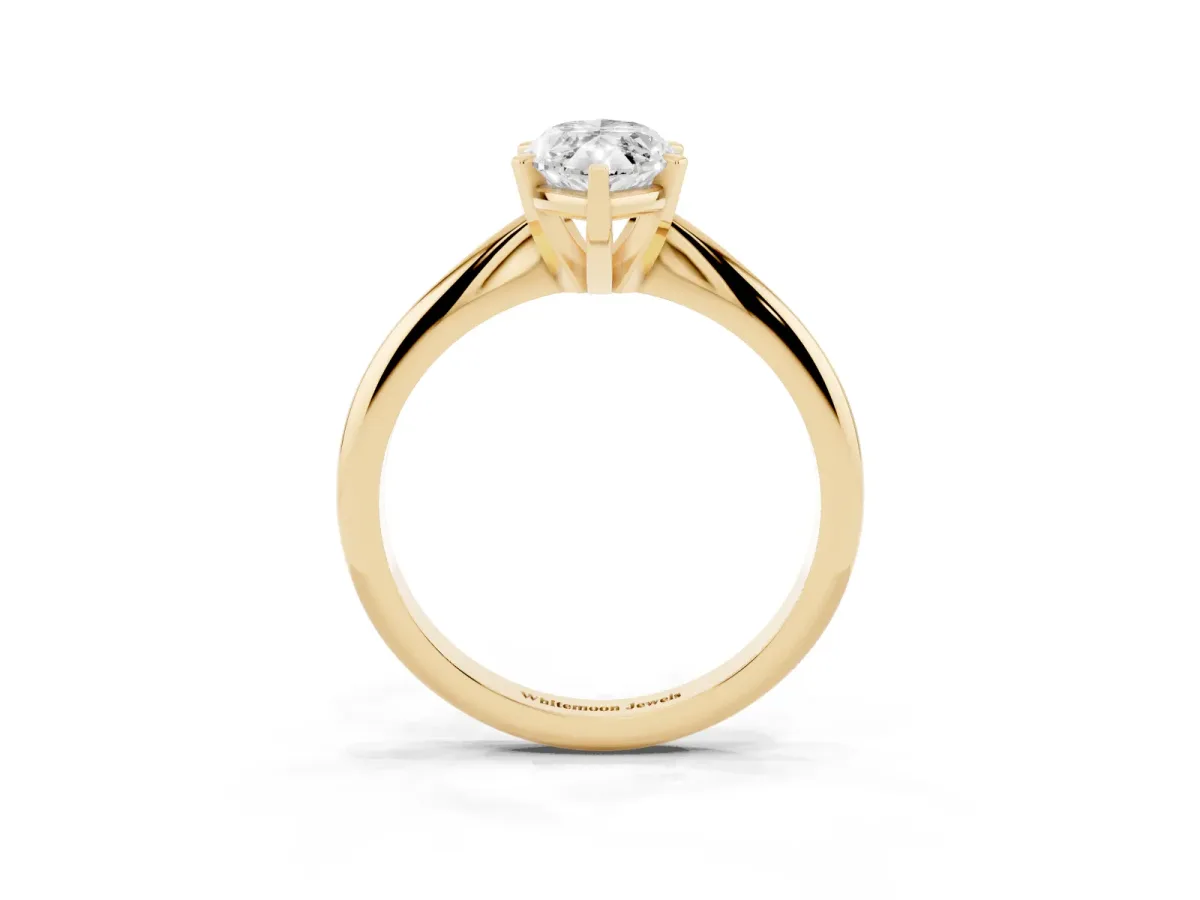 Marquise Cut Cut Solitaire Ring with Four-Prong Setting on a Classic Band Yellow gold